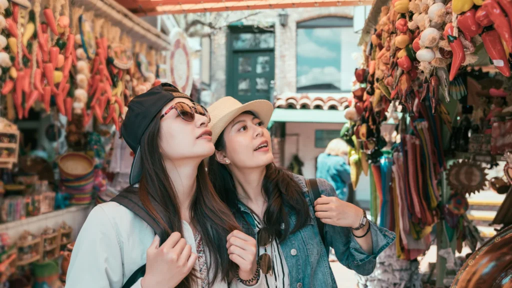 traveler exploring a local market and observing everyday cultural life