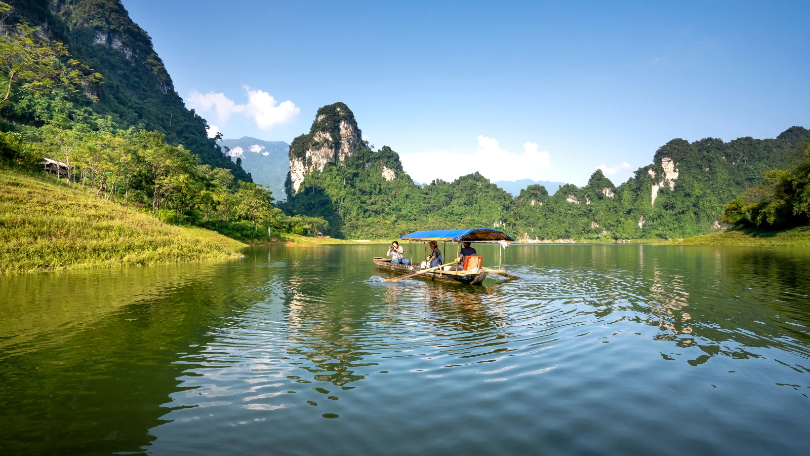 peaceful boat journey through quiet river landscape during slow travel