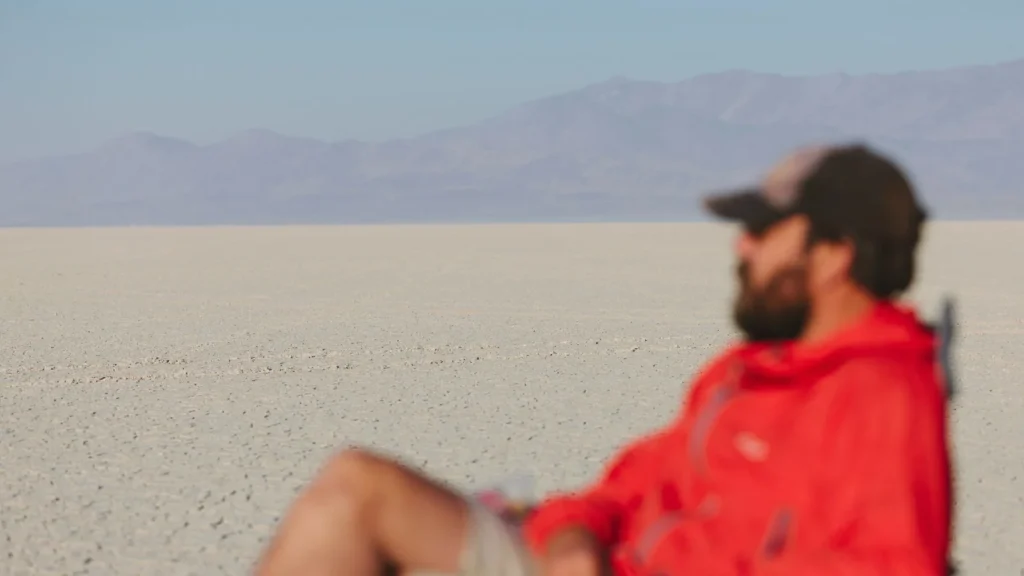 A man sitting gazing in horizon in Atacama 