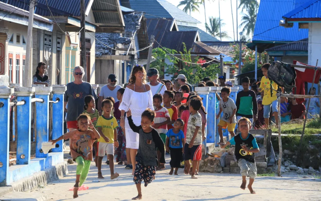 visiting small village duing Coral Reef Safari Indonesia