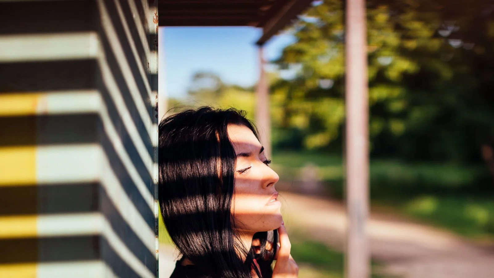 A woman enjoying sun.