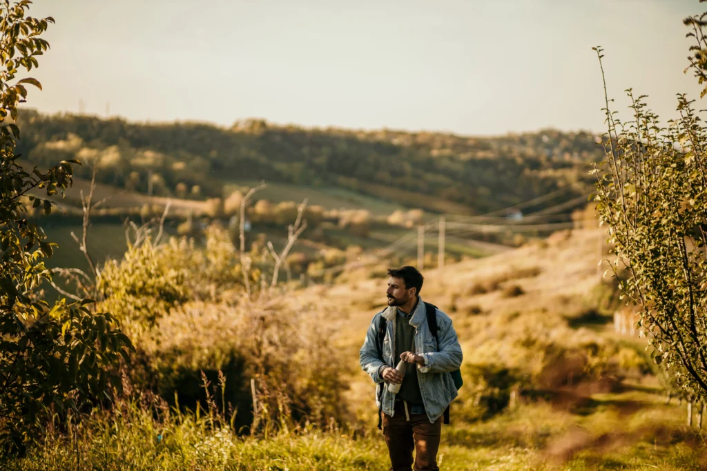 farmer walking through orchard portugal alentejo